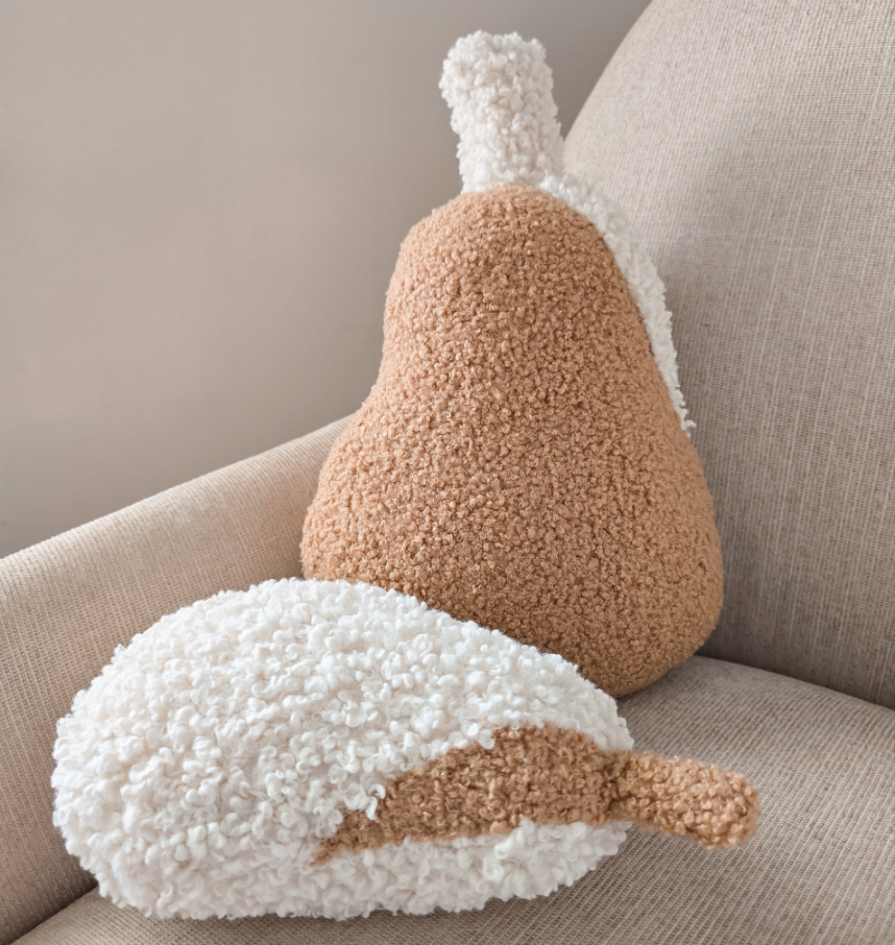 Neutral pear cushions styled on chair. Small and mini sizes.