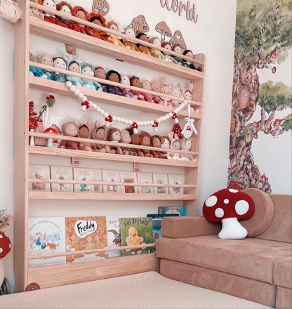 Red large mushroom cushion styled in whimsical playroom.