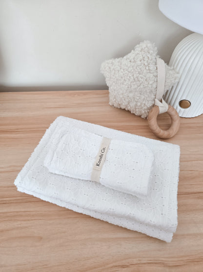 Handmade high quality burp cloths and face and body washers designed to be practical and aesthetic. White lace design.